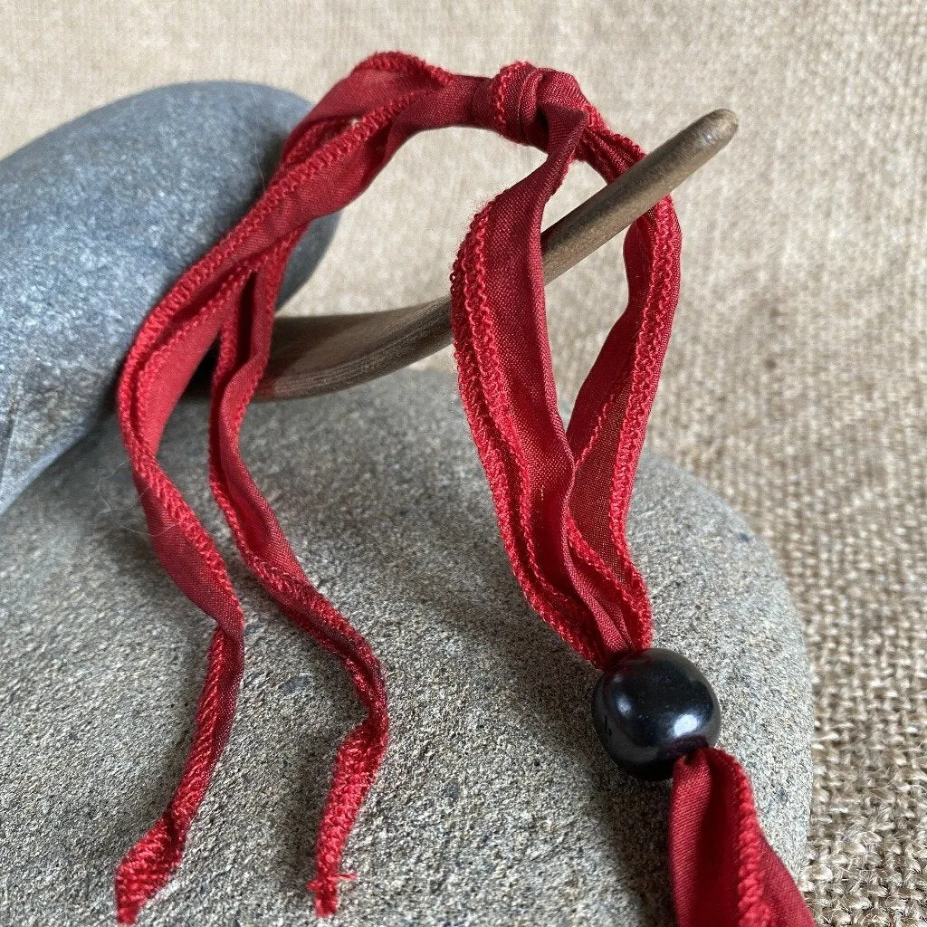 Shungite Donut Pendant on Red Silk